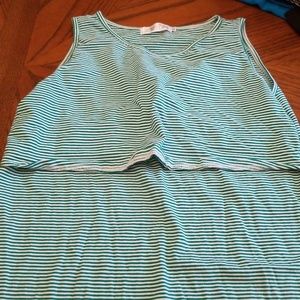 A green and white Latched Mama dress